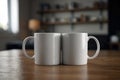 two white coffee cups are on a table one of which is white Two White Mugs in a Warm Living Room