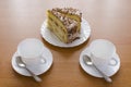 Two white cups of tea and cake Royalty Free Stock Photo