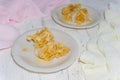 Two white dessert plates with pieces of honeycomb Royalty Free Stock Photo