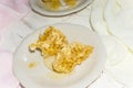 Two white dessert plates with pieces of honeycomb Royalty Free Stock Photo