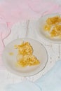 Two white dessert plates with pieces of honeycomb Royalty Free Stock Photo