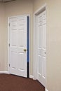 Two white doors one open Royalty Free Stock Photo