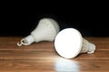 Two white emergency led bulbs with integrated battery Royalty Free Stock Photo