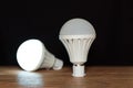 Two white emergency led bulbs with integrated battery Royalty Free Stock Photo