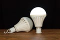 Two white emergency led bulbs with integrated battery Royalty Free Stock Photo