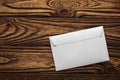 Two white envelopes with letters on old wooden dark background. Blanks for the designer. Concepts, ideas for postal services and e Royalty Free Stock Photo