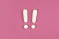 Two white exclamation marks on pink background. Flat lay, warning sign, keep attention, alert concept Royalty Free Stock Photo