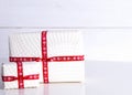 Two white gift boxes with polka dots Royalty Free Stock Photo