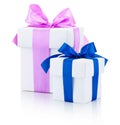 Two white gift boxes tied pink and blue ribbons bow Isolated