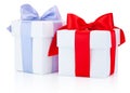Two white gift boxes tied red and blue ribbon bow Isolated on white background Royalty Free Stock Photo