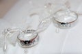 Two white gold wedding rings on white lace pad Royalty Free Stock Photo