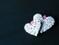 Two white hearts on black wooden table. Valentines, spring background. Mock up with copyspace. happy mothers day, romantic Royalty Free Stock Photo