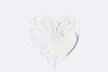Two white paper lace hearts on light background Royalty Free Stock Photo