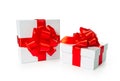 Two white pasteboard square gift boxes