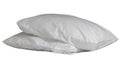 Two white pillows with cases after guest`s use at hotel or resor