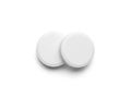 Two white pills isolated on white background Royalty Free Stock Photo