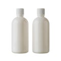 Two white plastic bottles with caps isolated on transparent background, isolated on white background Royalty Free Stock Photo