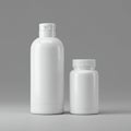 Two white plastic containers are displayed against a gray background. The left Royalty Free Stock Photo