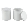 Two white plastic containers with lid and open lid shown separately Royalty Free Stock Photo
