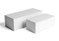 Two white rectangular blocks on a plain white background Royalty Free Stock Photo