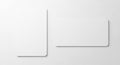 Two white rectangular cards on a light gray background. The left card is oriented Royalty Free Stock Photo