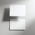 Two white rectangular objects casting shadows on a reflective surface Royalty Free Stock Photo