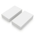 Two white rectangular objects placed diagonally against a plain background Royalty Free Stock Photo