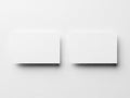 Two white rectangular objects with subtle shadows on a plain background Royalty Free Stock Photo
