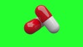 Two white-red pills isolated. Green Screen. Royalty Free Stock Photo