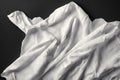 Two white sheets with folds on a black background Royalty Free Stock Photo