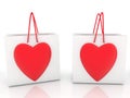 Two white shopping bags with red hearts Royalty Free Stock Photo