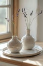 Two White Vases on Window Sill