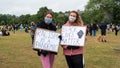 EXETER, DEVON, UK - June 06 2020: Two white women hold signs at a Black Lives Matter demonstration