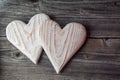 Two white wooden hearts on grey background, valentines or wedding day background love hearts Royalty Free Stock Photo