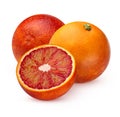 Two whole bloody red oranges and half isolated on white background Royalty Free Stock Photo