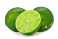 two whole fresh green lime with half isolated on white Royalty Free Stock Photo