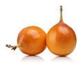 Two whole granadilla on white background