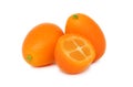 Two whole and a half kumquat (isolated)