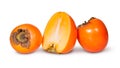 Two Whole And One Half Persimmons Royalty Free Stock Photo