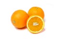 Two whole oranges and half Royalty Free Stock Photo