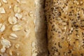 Two wholegrain seeded bread rolls side by side Royalty Free Stock Photo