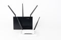 Two Wi-Fi  routers, wireless devices with two  and three antennas Royalty Free Stock Photo