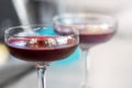 Two wide glasses of pomegranate red wine, close-up Royalty Free Stock Photo