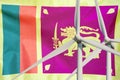 Two Wind Turbines for alternative energy on Sri Lanka flag background. Wind turbines generating electricity Royalty Free Stock Photo