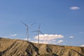 Two Wind Turbines on Hillside