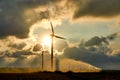 Two wind turbines and irrigating crop water gun