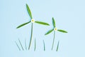 Two windmills made of fresh green leaves Royalty Free Stock Photo