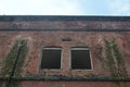 two windows of an ancient fort as seen from the inside of the beteng Royalty Free Stock Photo