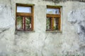 Two windows old clay wall Royalty Free Stock Photo