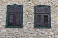 Two windows on old house Royalty Free Stock Photo